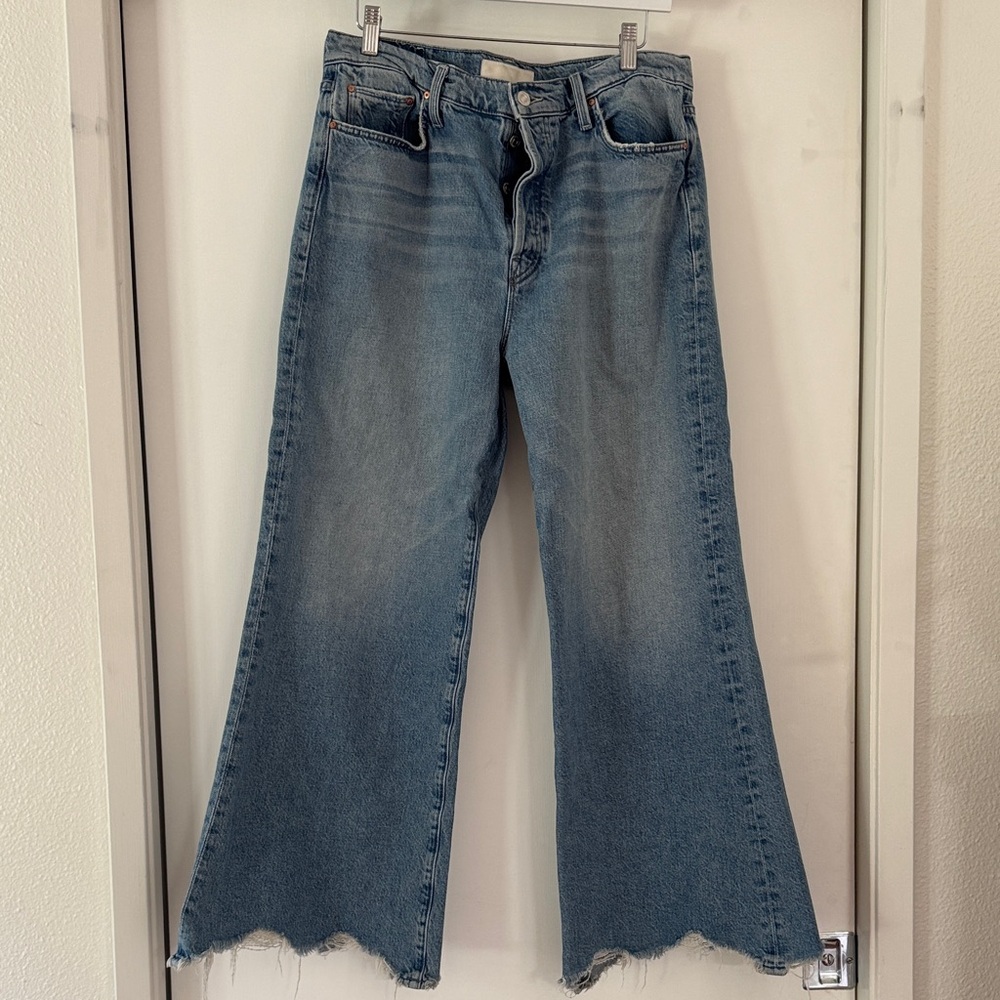 MOTHER Light Blue Flared Wide-Leg Jeans with Raw Hem